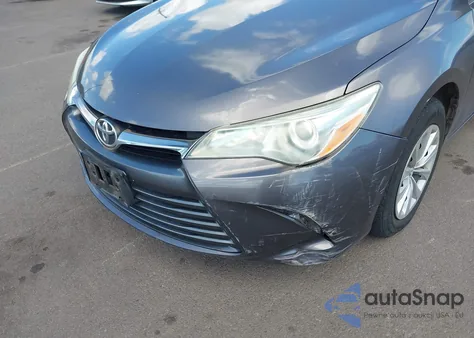 2015 Toyota Camry Le z USA, uszkodzony, nr VIN 4T1BF1FK6FU899000